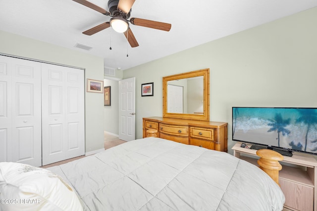 118 Bird Of Paradise Dr, Palm Coast, FL 32137 - bedroom with a closet and a ceiling fan