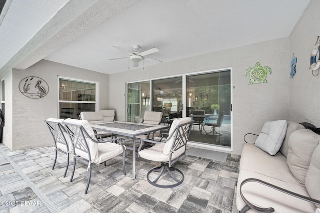 118 Bird Of Paradise Dr, Palm Coast, FL 32137 - view of patio / terrace with a ceiling fan and outdoor dining space