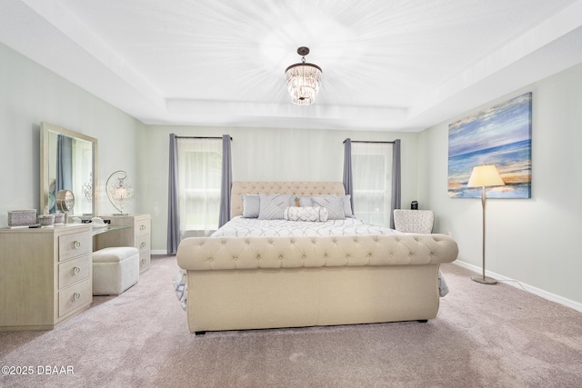 118 Bird Of Paradise Dr, Palm Coast, FL 32137 - bedroom featuring light carpet and a tray ceiling