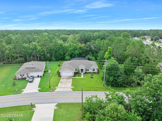 118 Bird Of Paradise Dr, Palm Coast, FL 32137 - aerial view of property and surrounding area featuring a heavily wooded area
