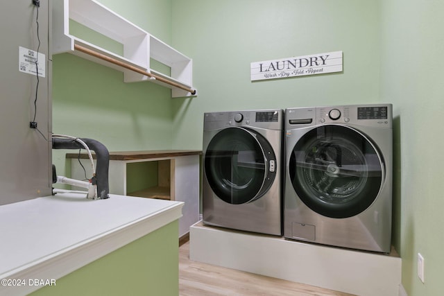 6 Willow Trce, Flagler Beach, FL 32136 - laundry room featuring separate washer and dryer and light wood-style flooring
