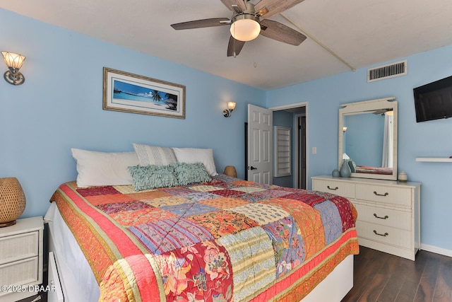 2800 N Atlantic Ave Unit 206, Daytona Beach, FL 32118 - bedroom featuring dark wood-style floors, baseboards, and a ceiling fan