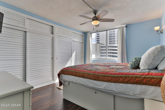 2800 N Atlantic Ave Unit 206, Daytona Beach, FL 32118 - bedroom featuring dark wood finished floors and a ceiling fan