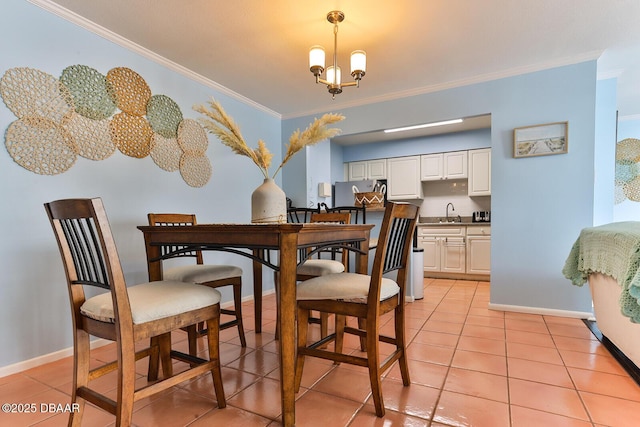 2800 N Atlantic Ave Unit 206, Daytona Beach, FL 32118 - dining space with a chandelier, ornamental molding, light tile patterned flooring, and baseboards