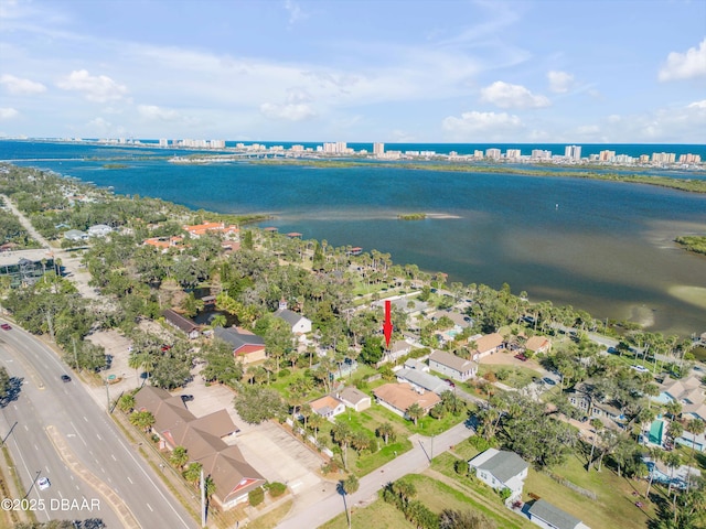 birds eye view of property featuring a water view