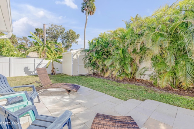 view of patio with a storage shed