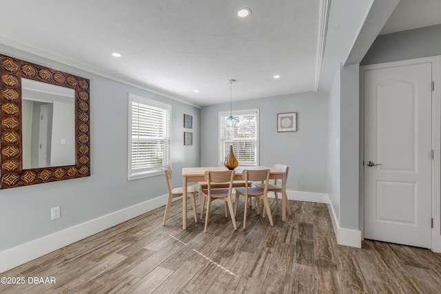 dining area with wood-type flooring