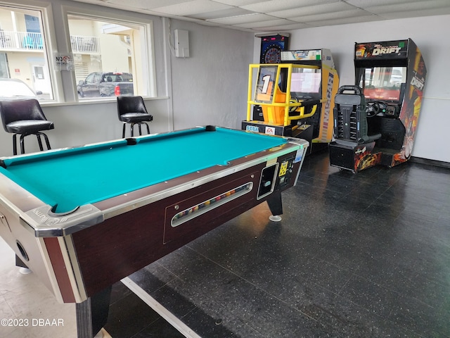 1233 S Atlantic Ave Unit 211, Daytona Beach, FL 32118 - recreation room with pool table and a drop ceiling
