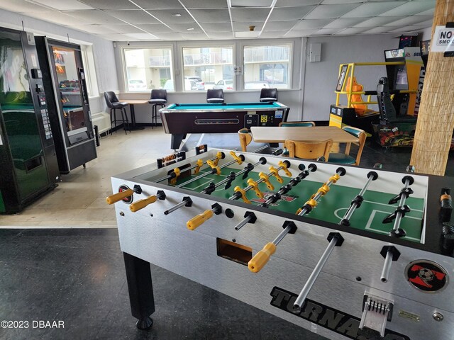 1233 S Atlantic Ave Unit 211, Daytona Beach, FL 32118 - recreation room with a drop ceiling, healthy amount of natural light, and billiards table