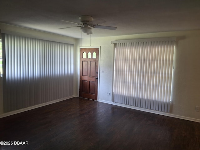 1031 NE 39th Ct, Ocala, FL 34470 - foyer with wood finished floors, a ceiling fan, and plenty of natural light