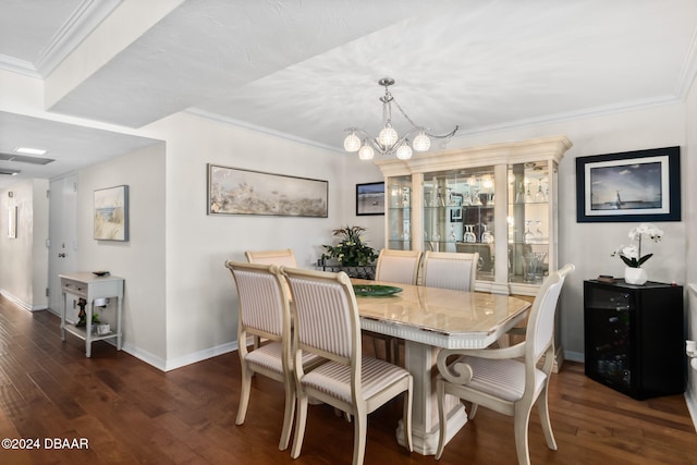 dining space with dark hardwood / wood-style flooring, a notable chandelier, and ornamental molding