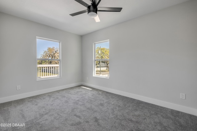 182 Howes St, Oak Hill, FL 32759 - carpeted spare room with baseboards and ceiling fan