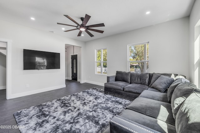 182 Howes St, Oak Hill, FL 32759 - living area featuring baseboards, dark wood-style flooring, ceiling fan, and recessed lighting