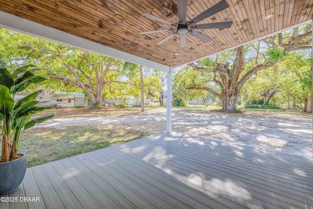 182 Howes St, Oak Hill, FL 32759 - wooden terrace with a ceiling fan