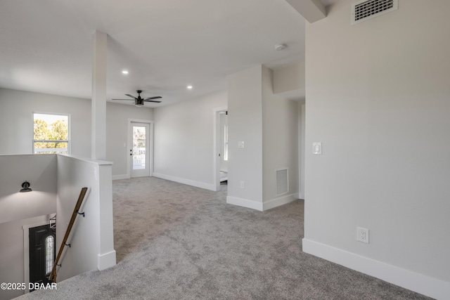 182 Howes St, Oak Hill, FL 32759 - unfurnished living room featuring carpet flooring, recessed lighting, ceiling fan, and visible vents