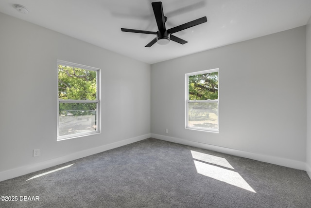 182 Howes St, Oak Hill, FL 32759 - carpeted empty room featuring baseboards and a ceiling fan