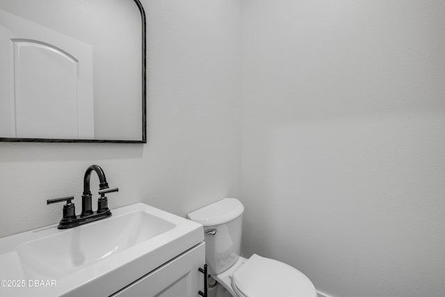 182 Howes St, Oak Hill, FL 32759 - bathroom with toilet and vanity