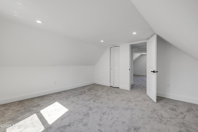 182 Howes St, Oak Hill, FL 32759 - additional living space featuring carpet, baseboards, and lofted ceiling