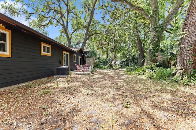 292 Fir St, Ormond Beach, FL 32174 - view of yard with central AC and a patio area