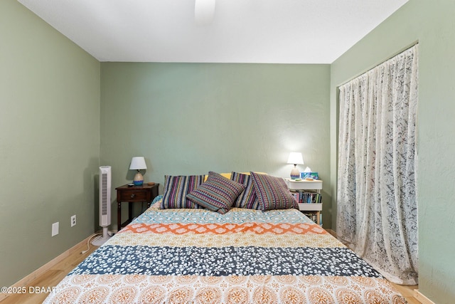 292 Fir St, Ormond Beach, FL 32174 - bedroom with wood finished floors and ceiling fan