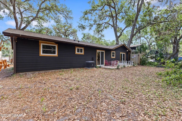 292 Fir St, Ormond Beach, FL 32174 - rear view of property with central AC and a patio