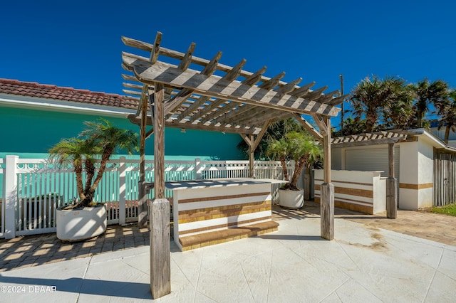 view of patio / terrace featuring a pergola