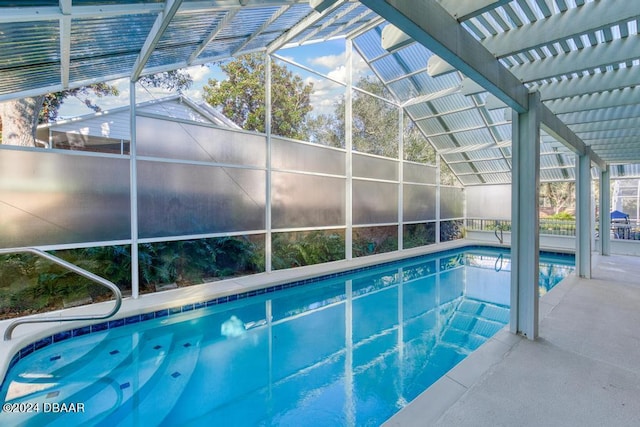 outdoor pool featuring a lanai and a patio