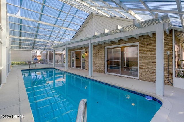 pool with a patio and a pergola