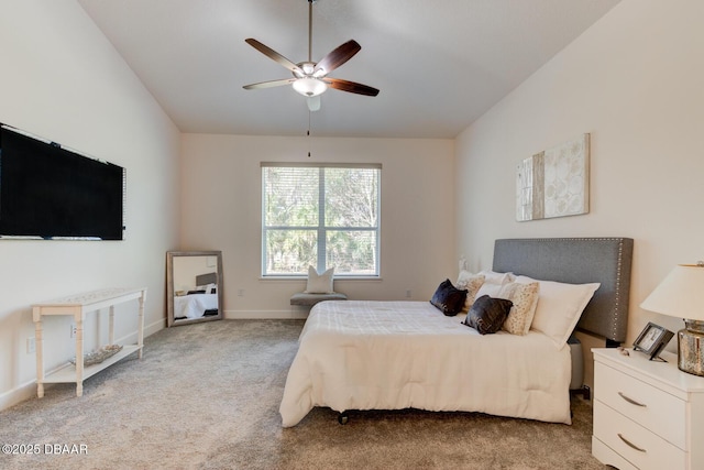 carpeted bedroom with lofted ceiling and ceiling fan