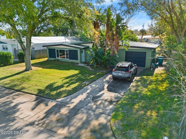 ranch-style home featuring a front yard and a garage