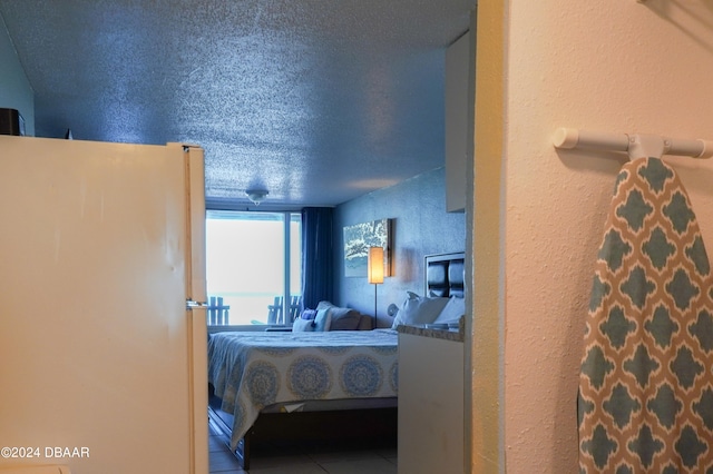 bedroom featuring a textured ceiling