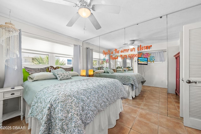 1167 Ocean Shore Blvd Unit 110, Ormond Beach, FL 32176 - bedroom with light tile patterned flooring and ceiling fan