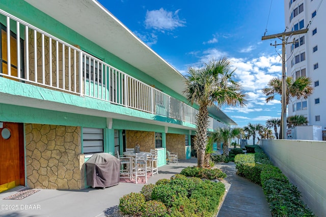 1167 Ocean Shore Blvd Unit 110, Ormond Beach, FL 32176 - view of building exterior featuring fence