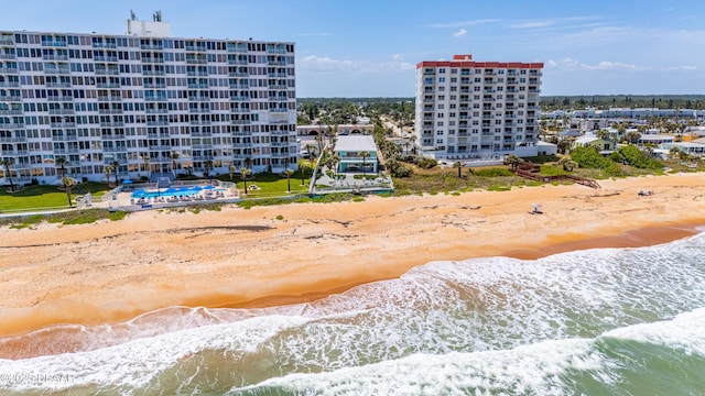 1167 Ocean Shore Blvd Unit 110, Ormond Beach, FL 32176 - drone / aerial view of expansive coastline and apartment complex