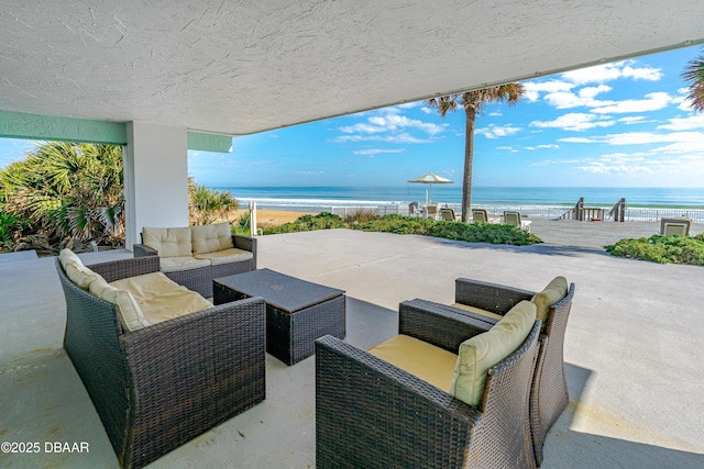 1167 Ocean Shore Blvd Unit 110, Ormond Beach, FL 32176 - view of patio with outdoor lounge area and a water view