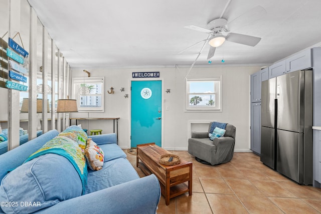 1167 Ocean Shore Blvd Unit 110, Ormond Beach, FL 32176 - living room with healthy amount of natural light, ceiling fan, and light tile patterned flooring