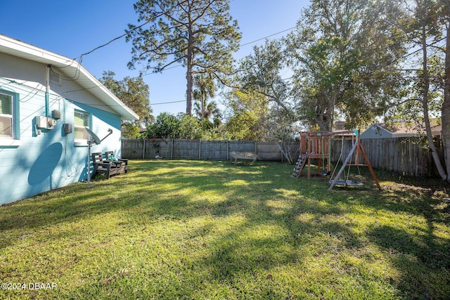 view of yard with a playground