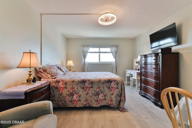 bedroom featuring wood finished floors