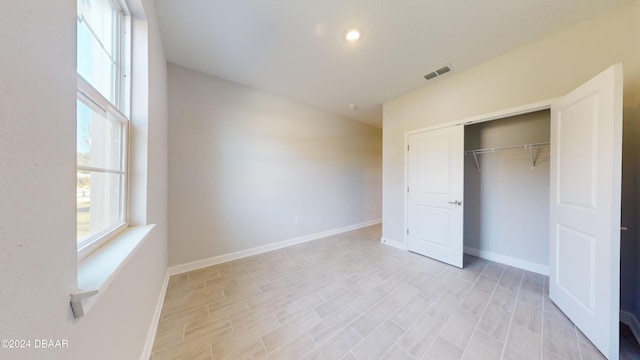 unfurnished bedroom featuring a closet