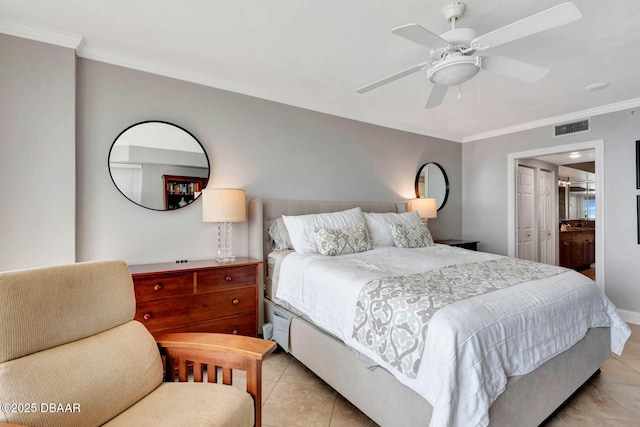 3315 S Atlantic Ave Unit 1606, Daytona Beach Shores, FL 32118 - bedroom featuring ornamental molding, ceiling fan, light tile patterned floors, and ensuite bath