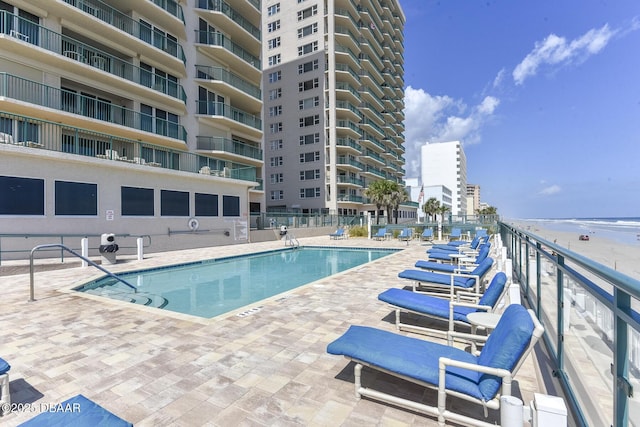 3315 S Atlantic Ave Unit 1606, Daytona Beach Shores, FL 32118 - community pool featuring a patio