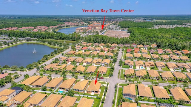 bird's eye view with a water view and a residential view