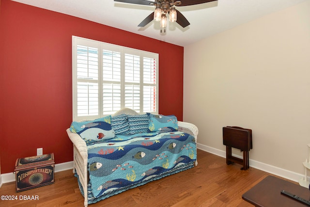 bedroom featuring wood-type flooring and ceiling fan