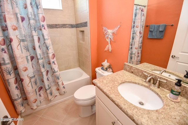 full bathroom with shower / bath combo, toilet, vanity, and tile patterned floors