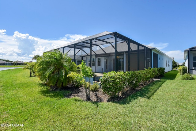 view of yard with a lanai