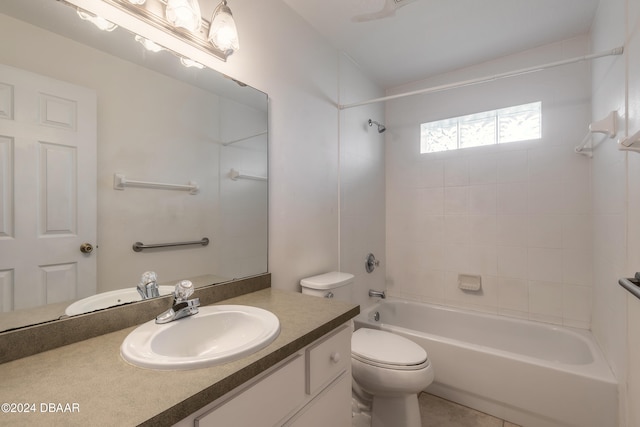 full bathroom featuring vanity, toilet, and tiled shower / bath