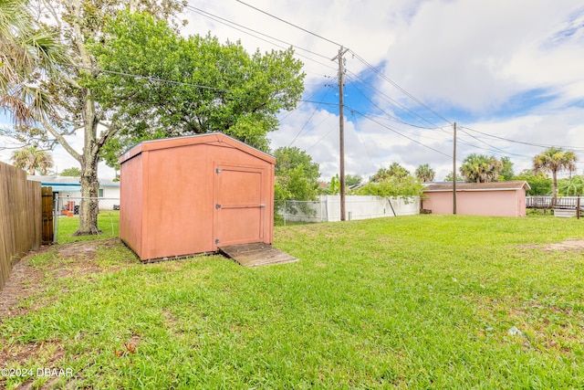 view of yard featuring a storage shed