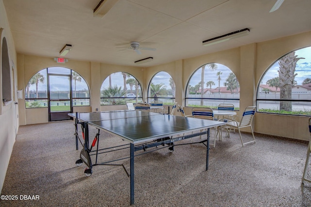 56 Los Lagos Blvd, Palm Coast, FL 32137 - rec room featuring a ceiling fan and carpet flooring