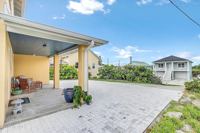 view of patio with a garage