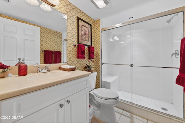 4650 Links Village Dr Unit C402, Ponce Inlet, FL 32127 - bathroom with wallpapered walls, a stall shower, and vanity